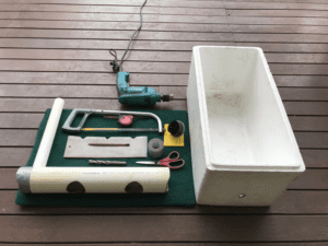 Materials and tools required laid out on a wooden table