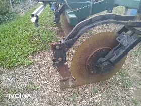 Coulter fitted to the back of a tractor